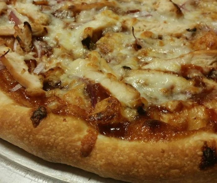 Roma's Pizza margherita and pepperoni pies